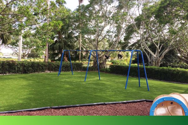 swing set on artificial turf
