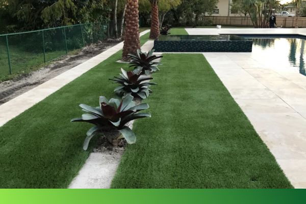 synthetic grass by a swimming pool